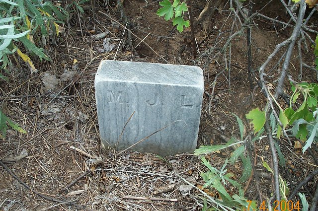 Footstone for Mary J. Lacy,

Lacy Cemetery, Barber County, Kansas.

Photo by Kim Fowles.