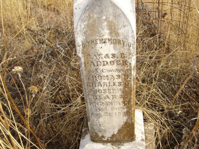 Paddock Family Gravestone in the Paddock Cemetery, Barber County, Kansas.

TO THE MEMORY OF
G.W. & S.R.
PADDOCK
And Children
THOMAS R.
CHARLES O.
JOSEPH.
CLARA.
AND INFANT.
ALL DIED
Apr. 21. 1885

Photo by Nathan Lee.