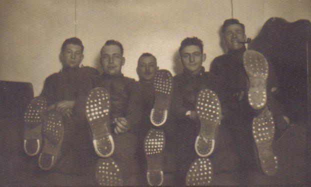 Left to Right:  Robert Clawson and Lyle Bullock, both from Sun City, Kansas. The others are unknown.

Back of photo captioned: 