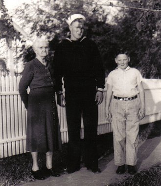 Mark McLain in his U.S. Navy uniform with his grandmother Artha Surber and a nephew (either Red or Barger Hunter).