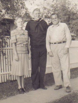 Mark McLain in his U.S. Navy uniform with Tom and Ruby (Massey) Murphy.