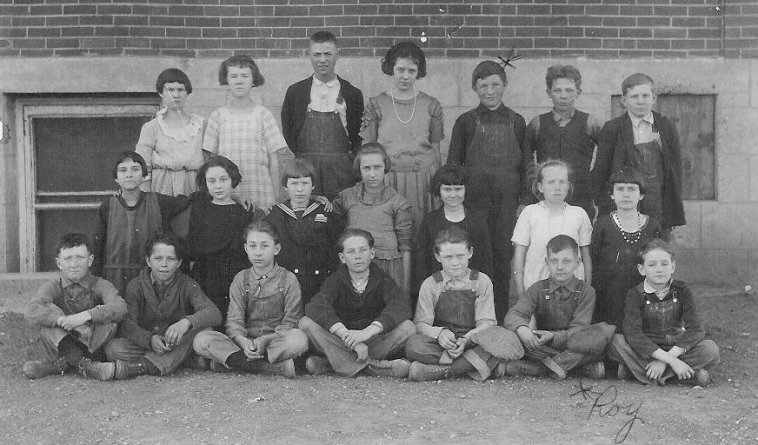 LeRoy Davis, in back row with asterick by his head, Lake City School, Barber County, Kansas.

Photo courtesy of Linda (Davis) McDowell.