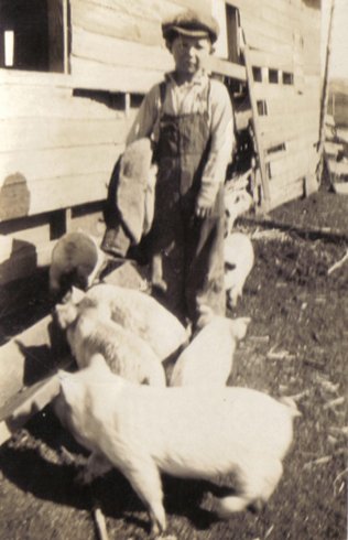 Raymond Harold 'Bill' Hoagland as a child with some pigs.

Photo courtesy of Ronnie Hoagland and Kim (Hoagland) Fowles.