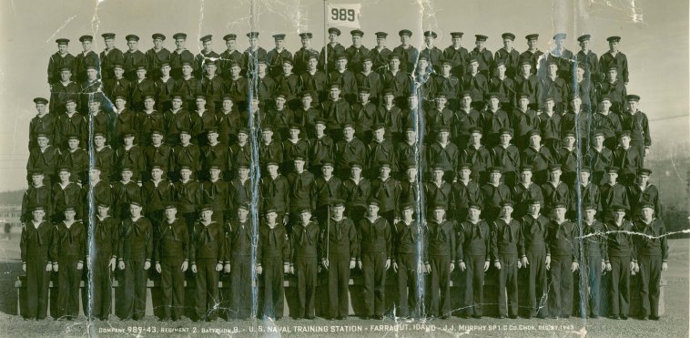 Company 989-43, Regiment 2, Battalion B, U.S. Naval Training Station, Farragut, Idaho - J.J. Murphy SP1/C Co. Cmdr. Dec. 27, 1943.

Photo courtesy of Kim (Hoagland) Fowles.