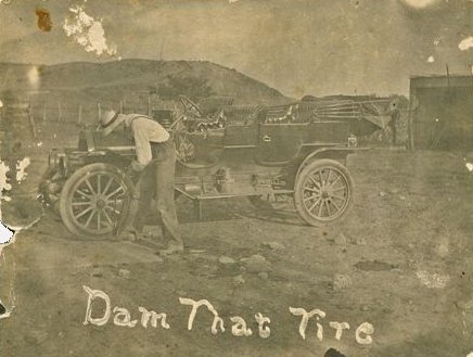 Ralph N. Massy of Barber County, Kansas, fixing a flat tire.

Undated photo courtesy of Lee (Massey) Ives, daughter of Ray Massey, grand-daughter of J.P. Massey.