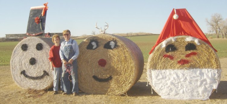 Norman and Lois Mills of Barber County, Kansas, with their 2006 Christmas decorations.

From left: Frosty the Snowman, Rudolph the Red-nosed Reindeer and Santa Claus.

Photo by Nathan Lee.