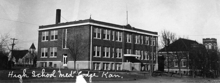 Medicine Lodge High School in the 1930s,  Barber County, Kansas.

This school is still in use in 2005 and is the Intermediate School (grades 5-8). Note the Christian Church on the left and the Presbyterian Church on the right.

Photo courtesy of Bob Osborn.