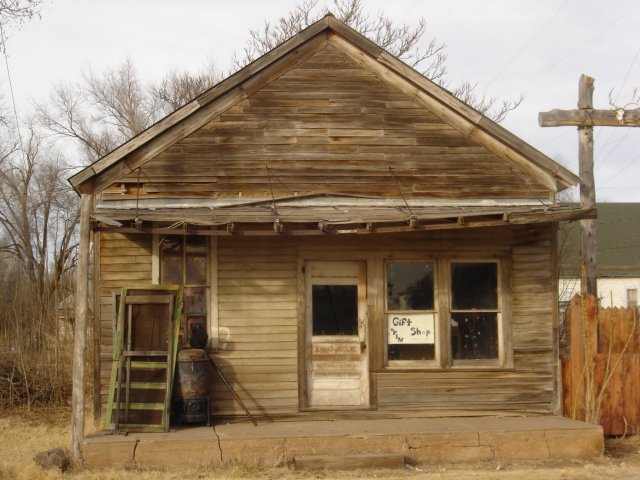Old Sun City Schoolhouse, now used as a gift shop. It is just west of Buster's bar and grill in Sun City, Kansas. 


Photo by Nathan Lee, 15 December 2006.