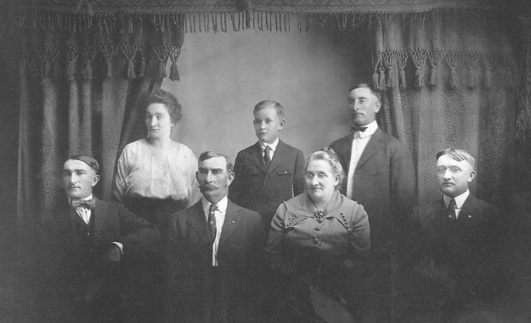James Marion Williams Family of Comanche County, Kansas.

Back row: Mary Agnes Williams,  Boyd Delmas Williams, Guy J. Williams.

Front row: Ora Lee Williams, James Marion Williams, Nellie Irena (Bordner) Williams, 
Thomas A. Williams. 

Photo courtesy of Nella Hartley of Sterling, Kansas