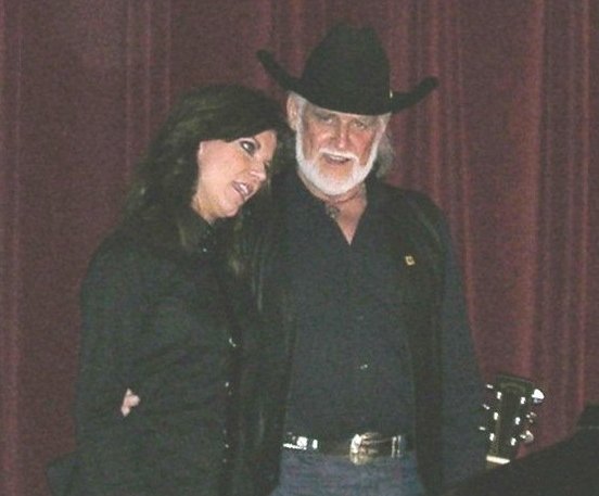 Daryl Schiff singing 'Happy Trails' with his daughter, Martina (Schiff) McBride, at the close of the 01 Oct 2006 Wilmore Opry show at the Heritage Center near Medicine Lodge, Kansas.

Photo courtesy of Rick Sabral.