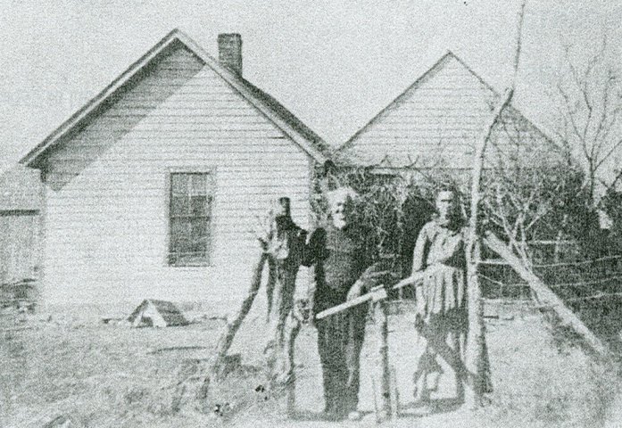 Johnson M. Adams and his wife, Elizabeth (Owens) Adams nee Joseph, at their home, Sun City, Barber County, Kansas.