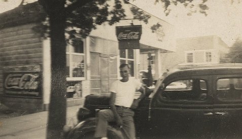Wendel Ferrin with his 1935 Ford in front of Ernest 