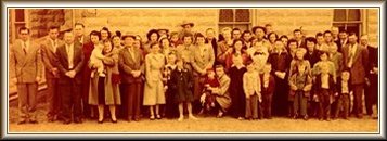 The congregation of the Wilmore Church of Christ, Wilmore, Comanche County, Ks, July 1952. Photo by James Allen Nichols;  from the collection of Wendel Ferrin, who is the tall man in the center of the back row. Weldon Trummel is the second person from the left and 'Slim' Masterson is the 4th man from the left.