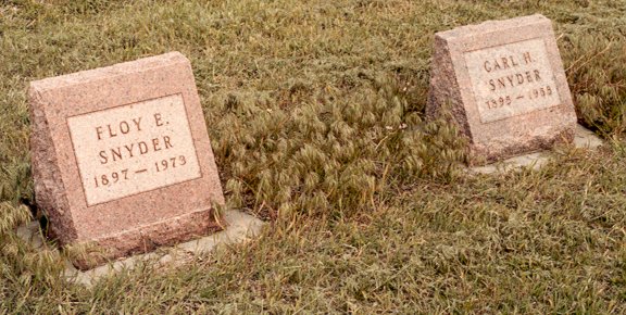 Gravestones of Floy E. & Carl H. Snyder, Wilmore Cemetery, Wilmore, Comanche County, Kansas. Photo by John Edward (Ed) Schrock, used with permission of Janet Schrock Hubbard.