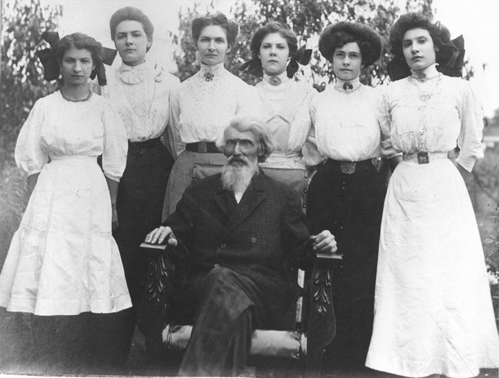 Photo of Joseph Postel and daughters