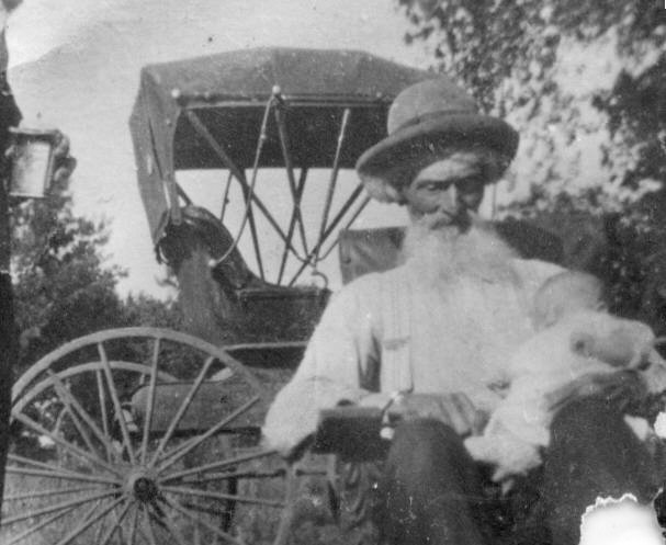 Photo of Joseph Postel and baby